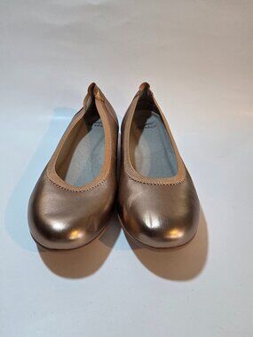 Dansko Rose Gold Platform Flats